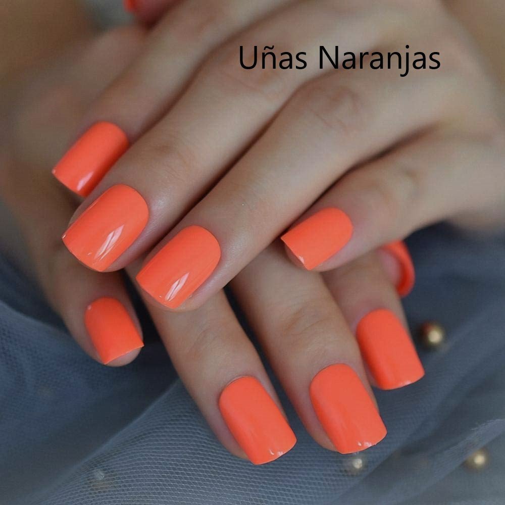 Uñas naranjas neón elegantes en moda