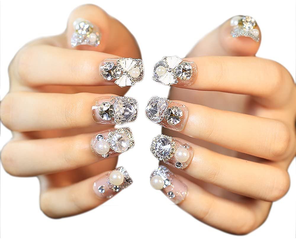 uñas postizas con lazo de diamante y perla