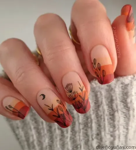 Uñas naranjas estampados de paisajes